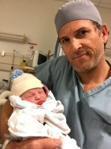 Justin West, MD and his son Andrew