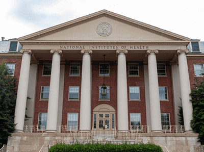 View of the main historical building (Building 1) of the National Institutes of Health (NIH) inside Bethesda campus.